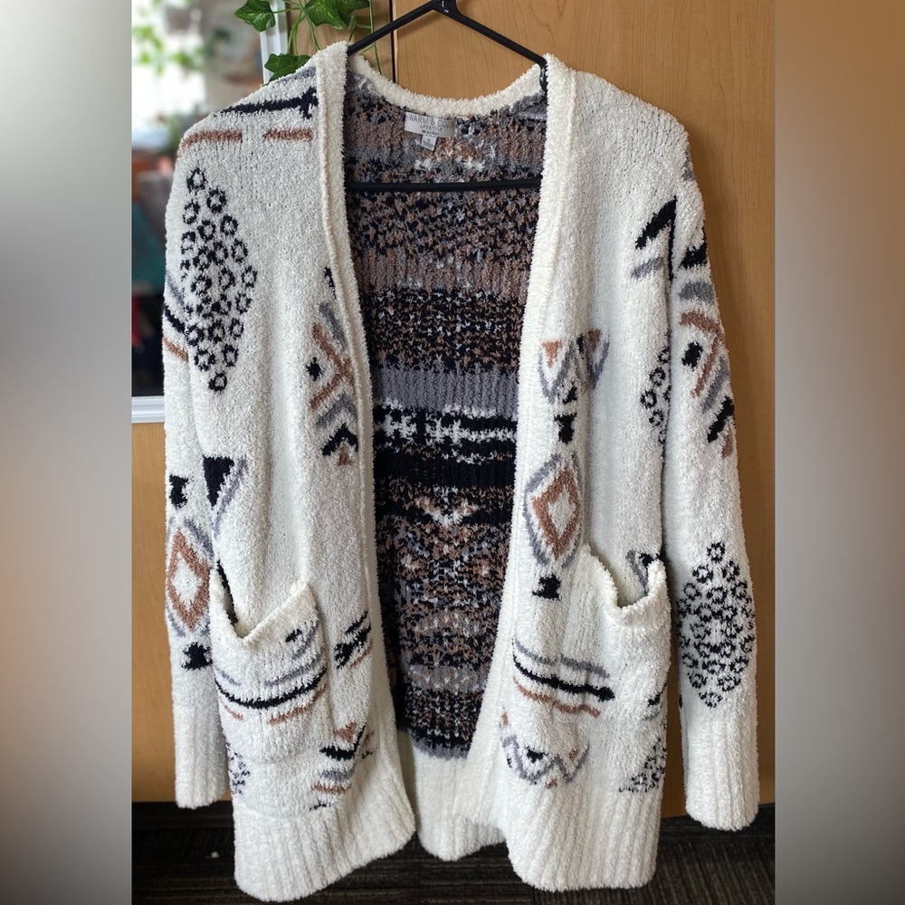 cardigan. very thick. arms are tighter/fitted material.